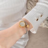 ساعة نسائية حصير باللون الذهبي الفضي ميناء فضي