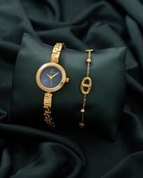 ساعة وإسواره استيل باللون الذهبي