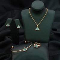 طقم أطفال باللونين الذهبي والسماوي