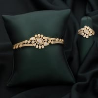 طقم اسوارة وخاتم باللون الذهبي