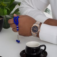 ساعة رجالية باللونين الفضي والنحاسي ميناء كحلي