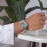 ساعة رجالية استيل باللون الفضي ميناء اخضر.