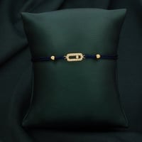 اسوارة نسائية خيط باللون الكحلي على الذهبي