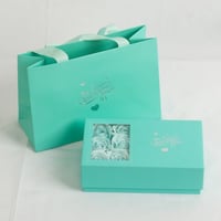 تغليف اكسسوارات وردة روز دائمه بلون تيفاني