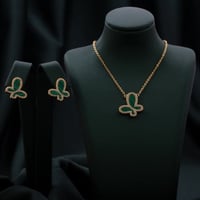 طقم أطفال باللونين الذهبي والأخضر