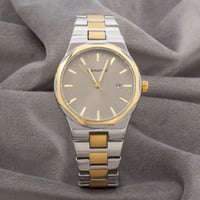 ساعة رجالية باللونين الذهبي والفضي