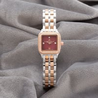 ساعة نسائية باللون النحاسي فضي ميناء احمر