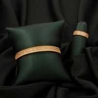 طقم اسوارة وخاتم باللون الذهبي