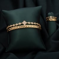 طقم اسوارة وخاتم باللون الذهبي