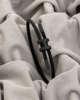 اسوارة استيل الخيط باللون الاسود