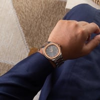 ساعة رجالية باللون النحاسي والفضي