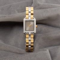 ساعة نسائية متفردة باللون الذهبي الفضي ميناء رصاصي