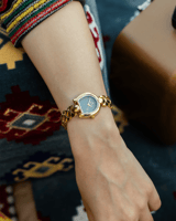 ساعه استيل باللون الذهبي رصاصي