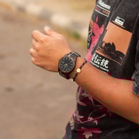 ساعة رجالية معا اسواره خيط استيل باللون الاسود