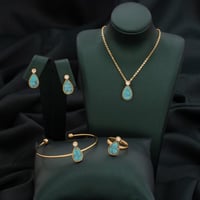 طقم أطفال باللونين الذهبي والسماوي