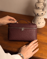 شنطة صغيره باللون العودي