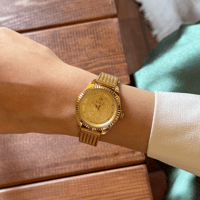 ساعة نسائية بسير حصير ملفت باللون الذهبي ميناء ذهب...