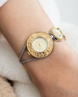 ساعة الجنيهات باللون المكس ميناء ذهبي