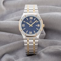 ساعة ستيل باللون الذهبي والفضي