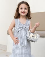 صُممت لتكون قطعة مكملة لطفلتك بحجم ميني