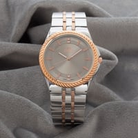 ساعة رجالية باللون الفضي والنحاسي