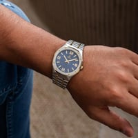 ساعة ستيل باللون الذهبي والفضي