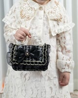 صُممت لتكون قطعة مكملة لطفلتك بحجم ميني