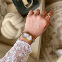 الساعة الاستيل النسائية ذات التفاصيل المميزة لإطلا...