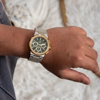 ساعة ستيل باللون الذهبي و الفضي أخضر