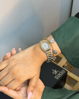 ساعة بتصميم مبتكر باللون المكس ميناء فضي