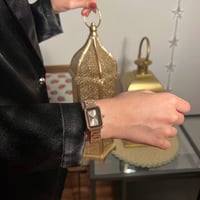 ساعة نسائية باللونين الفضي والنحاسي