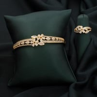 طقم اسوارة وخاتم باللون الذهبي