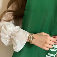 ساعة نسائية حصير باللون الذهبي ميناء رصاصي