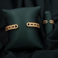 طقم اسوارة وخاتم باللون الذهبي