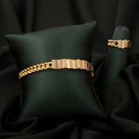 طقم اسوارة وخاتم باللون الذهبي