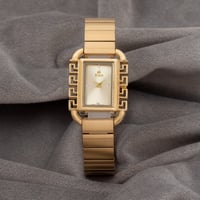 ساعة نسائية باللون الذهبي مينا ذهبي