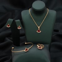 طقم أطفال باللونين الذهبي والعودي