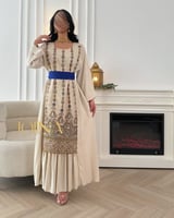 جلابية بحزام نيلي