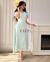 فستان تيفاني مقصوص باليزر ومزين بفصوص ناعمه