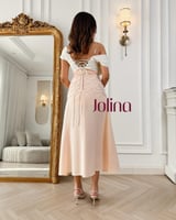 فستان ون شولدر عاجي بتطريز لؤلؤي