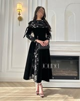 فستان أسود مخمل بتطريز ولمعة