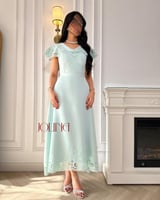 فستان تيفاني مقصوص باليزر ومزين بفصوص ناعمه