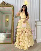 فستان سهرة اصفر فاتح