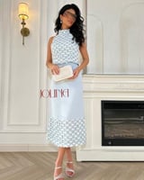 طقم سماوي ناعم بتفاصيل بارزه وقصة مستقيمة