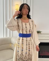 جلابية بحزام نيلي