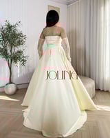 فستان سهرة اصفر فاتح