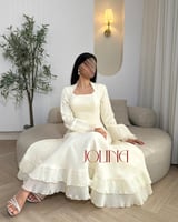 فستان اصفر ليموني بتطريز فصوص وكسرات من الاطراف