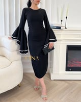 فستان اسود باكمام واسعة