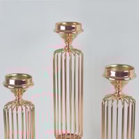 طقم شمعدان ذهبي