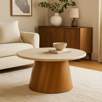 طاولة قهوة دائرية أنيقة بلون بني طبيعي، بتصميم عصر...